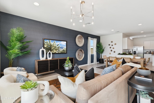 living room with an inviting chandelier