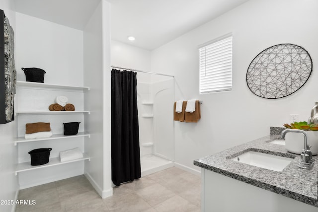 bathroom with vanity and curtained shower