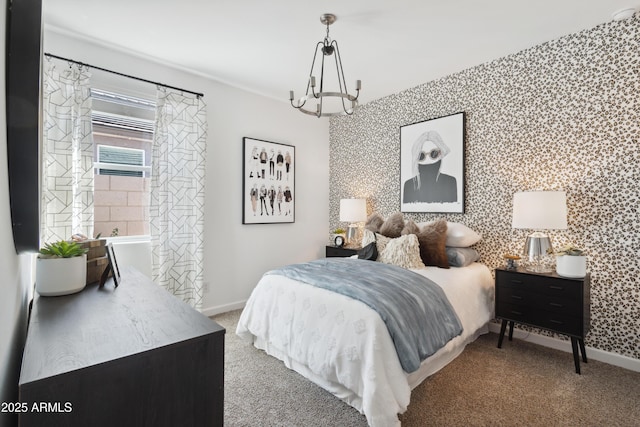 carpeted bedroom featuring a chandelier