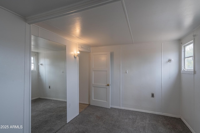 spare room featuring carpet floors