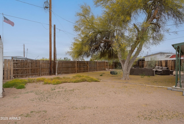 view of yard with a fenced backyard
