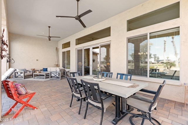 view of patio with ceiling fan and an outdoor hangout area