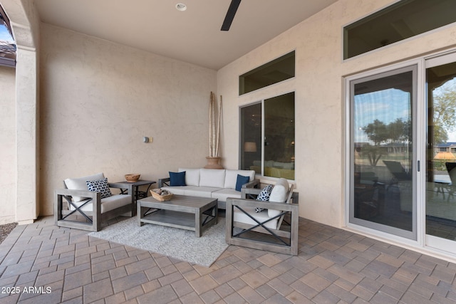 view of patio / terrace with outdoor lounge area and ceiling fan