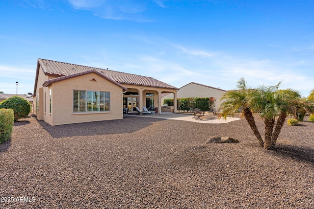 rear view of house with a patio area