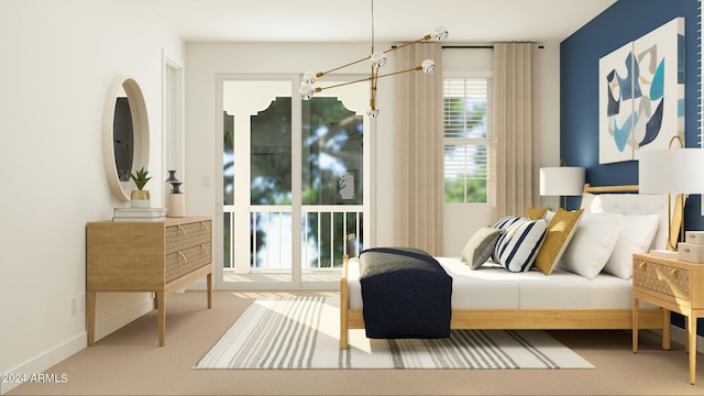 bedroom with carpet floors and a notable chandelier