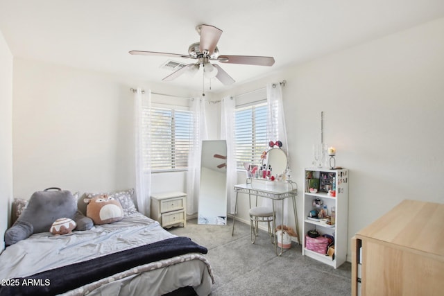 carpeted bedroom featuring ceiling fan