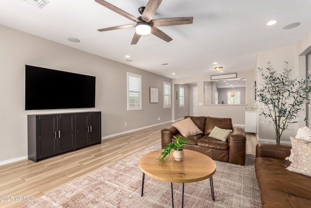6550 S 24th Pl, Phoenix, AZ 85042 - living room featuring a ceiling fan, light wood-style floors, baseboards, and recessed lighting
