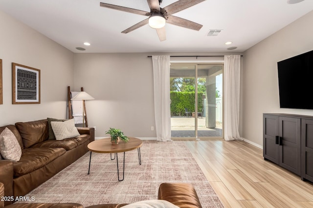 6550 S 24th Pl, Phoenix, AZ 85042 - living room featuring ceiling fan, light wood-style floors, baseboards, and recessed lighting