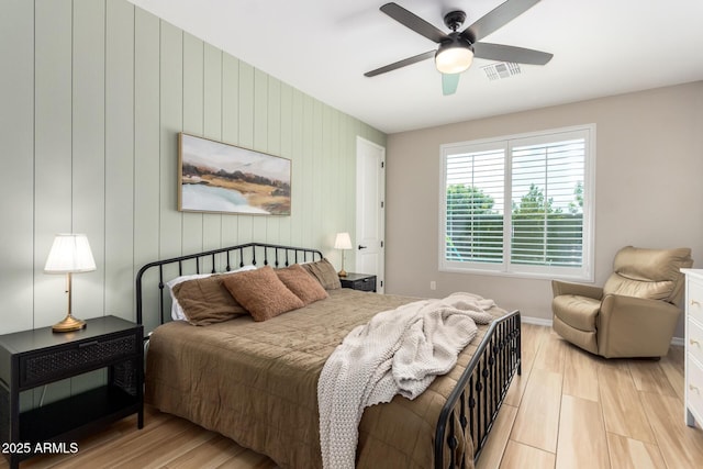 6550 S 24th Pl, Phoenix, AZ 85042 - bedroom featuring wood finished floors, baseboards, and ceiling fan