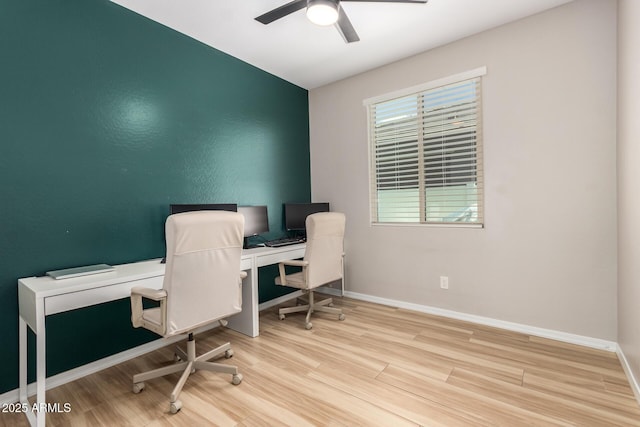 6550 S 24th Pl, Phoenix, AZ 85042 - office space featuring a ceiling fan, wood finished floors, and baseboards