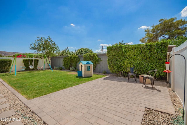 6550 S 24th Pl, Phoenix, AZ 85042 - view of patio featuring a playground