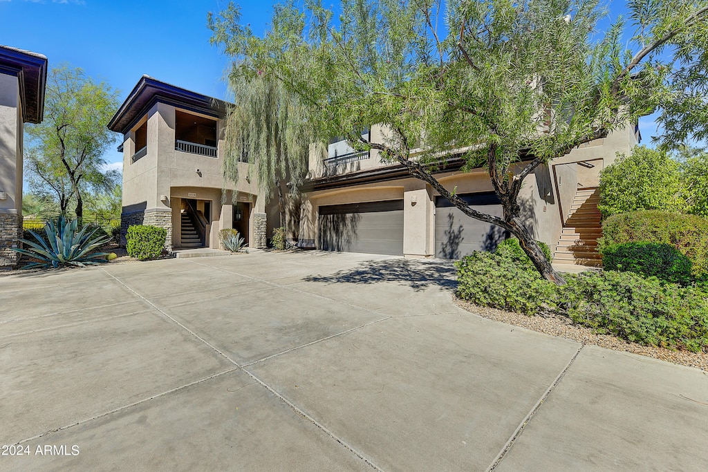 view of front of property featuring a garage