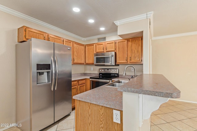 kitchen with sink, appliances with stainless steel finishes, a breakfast bar area, light tile patterned floors, and ornamental molding