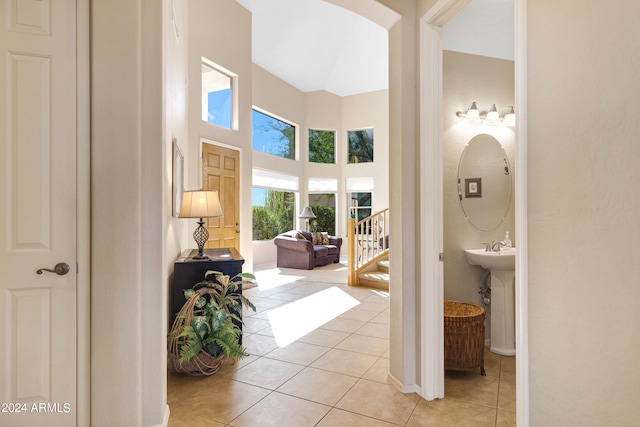 hallway with light tile patterned floors