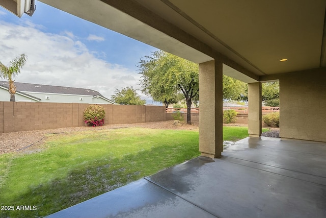 view of yard featuring a patio and a fenced backyard