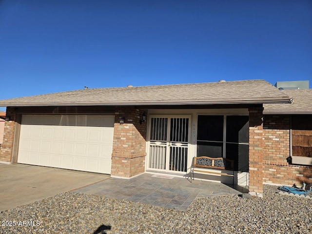 ranch-style house with a garage