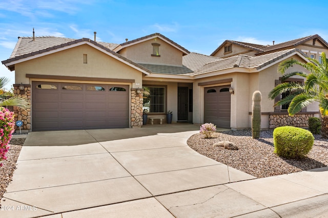 view of front of home with a garage