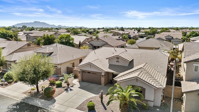 birds eye view of property featuring a residential view and a mountain view