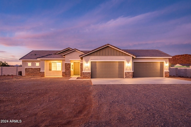 view of front of home with a garage