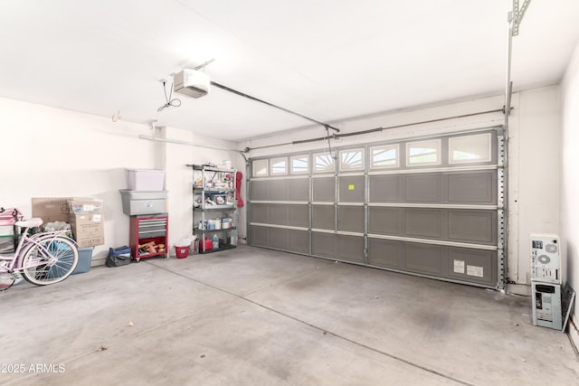8637 W Kathleen Rd, Peoria, AZ 85382 - garage featuring heating unit and a garage door opener