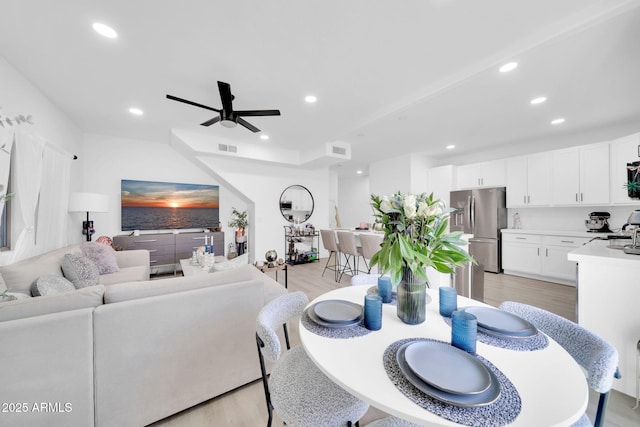 3034 N 39th St Unit 12, Phoenix, AZ 85018 - dining area with light wood-style floors, recessed lighting, and ceiling fan