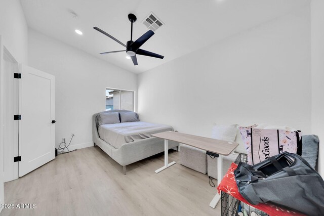 3034 N 39th St Unit 12, Phoenix, AZ 85018 - bedroom featuring wood finished floors, lofted ceiling, recessed lighting, and ceiling fan
