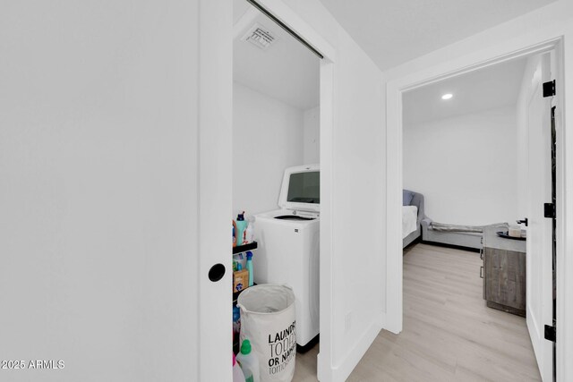 3034 N 39th St Unit 12, Phoenix, AZ 85018 - washroom featuring washer / dryer, wood finished floors, and recessed lighting