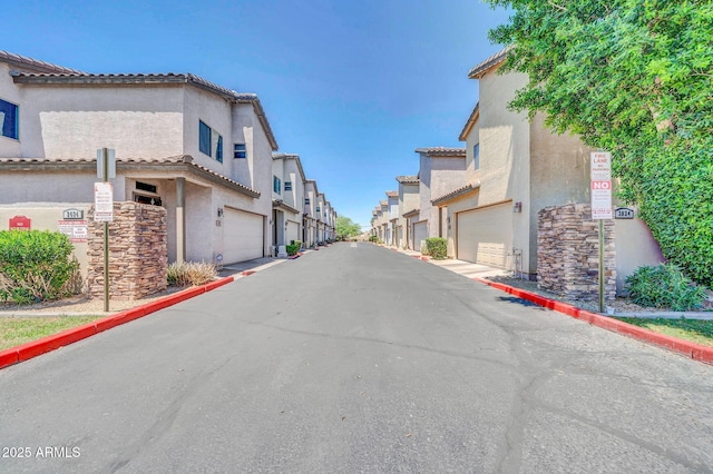 3034 N 39th St Unit 12, Phoenix, AZ 85018 - view of asphalt road featuring a residential view and curbs
