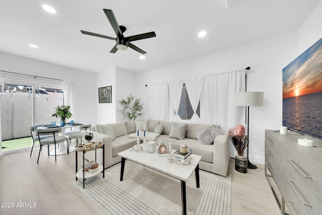 3034 N 39th St Unit 12, Phoenix, AZ 85018 - living room featuring light wood finished floors, ceiling fan, and recessed lighting