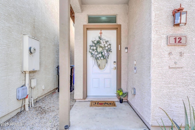 3034 N 39th St Unit 12, Phoenix, AZ 85018 - doorway to property with stucco siding