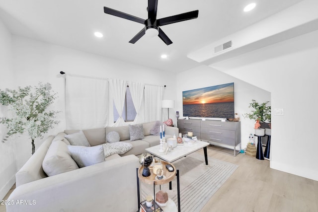 3034 N 39th St Unit 12, Phoenix, AZ 85018 - living room featuring light wood finished floors, a ceiling fan, and recessed lighting