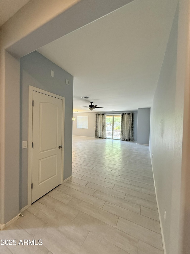 1241 E Palo Verde Dr, Casa Grande, AZ 85122 - hall featuring baseboards and light wood-style floors