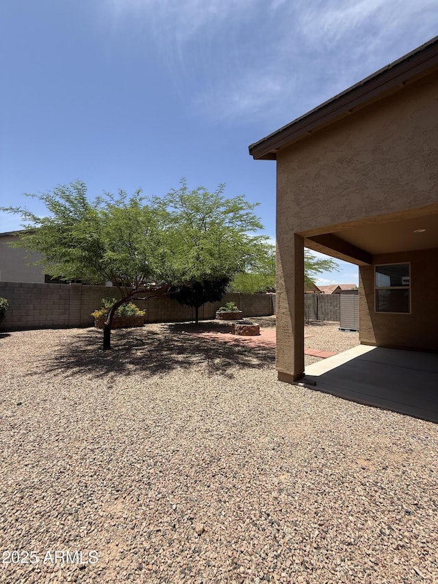 1241 E Palo Verde Dr, Casa Grande, AZ 85122 - fenced backyard with a patio area