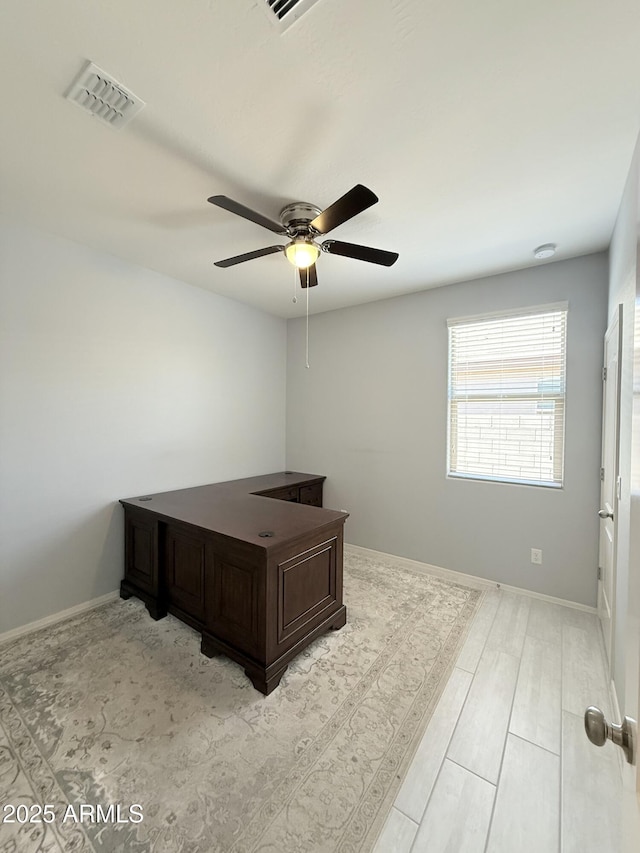 1241 E Palo Verde Dr, Casa Grande, AZ 85122 - unfurnished office with a ceiling fan and baseboards