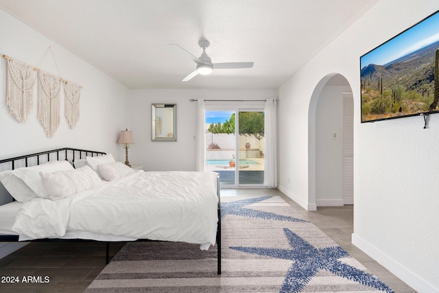 bedroom featuring access to exterior, light wood-type flooring, and ceiling fan