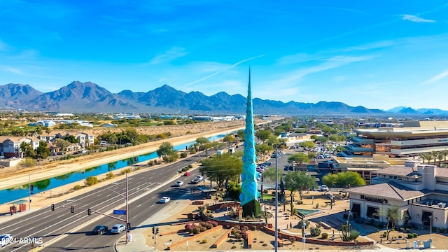 bird's eye view with a water and mountain view