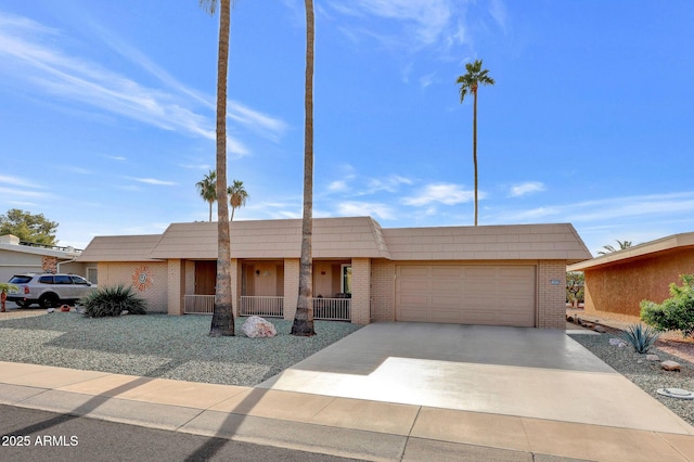 ranch-style home with a garage