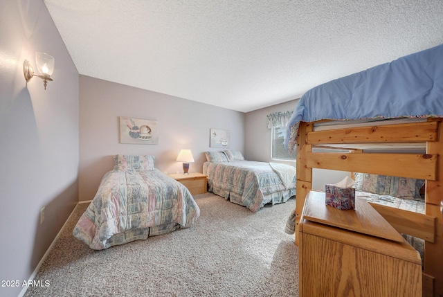 carpeted bedroom with a textured ceiling