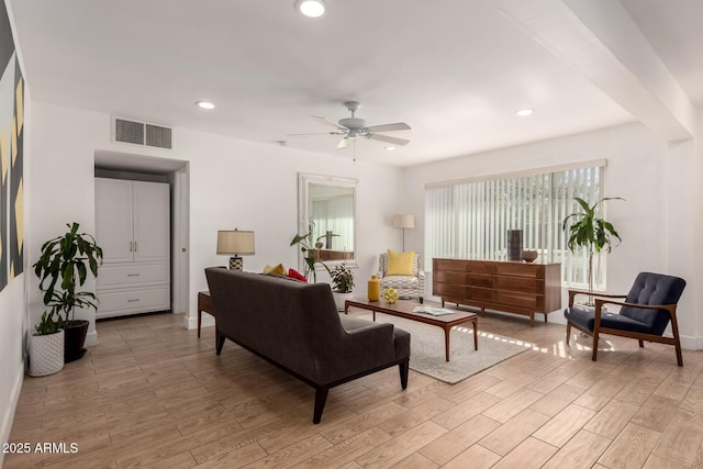 living area with visible vents, recessed lighting, a ceiling fan, and light wood-style floors