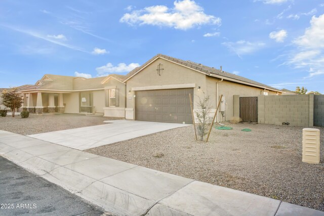 view of front of property featuring a garage