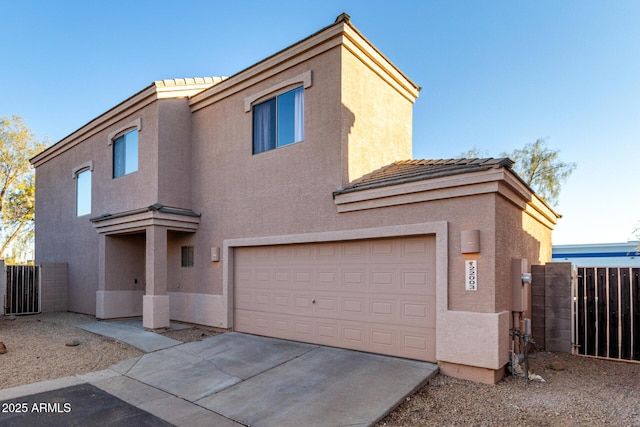 view of front of property featuring a garage