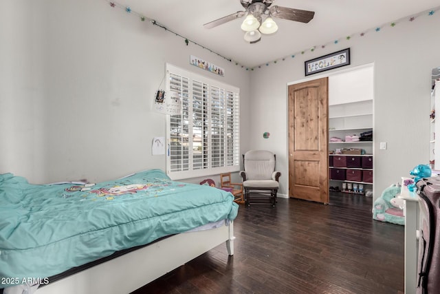 bedroom featuring ceiling fan and dark hardwood / wood-style flooring