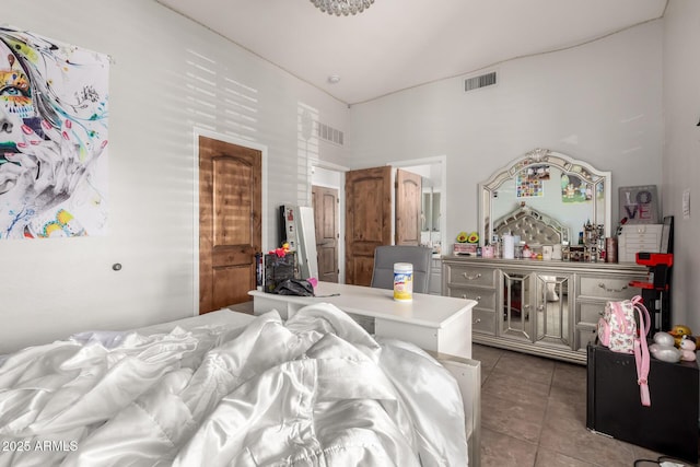 bedroom featuring light tile patterned floors