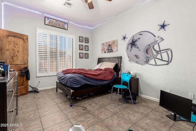 tiled bedroom with ceiling fan