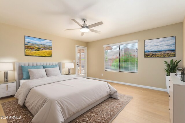 full bathroom with vanity, hardwood / wood-style floors, shower / tub combination, and toilet