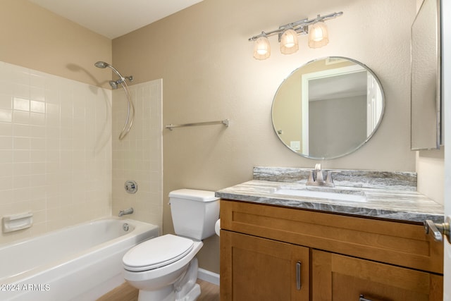 full bathroom with toilet, hardwood / wood-style floors, vanity, and shower / bath combination