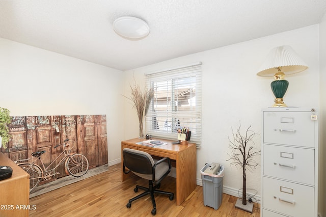 1445 W Wood Dr, Phoenix, AZ 85029 - office area featuring light wood finished floors and baseboards