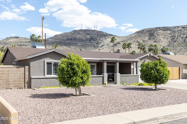 1445 W Wood Dr, Phoenix, AZ 85029 - ranch-style house with a mountain view, stucco siding, and covered porch