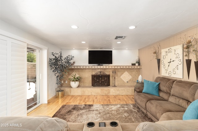 1445 W Wood Dr, Phoenix, AZ 85029 - living area with wood finished floors, recessed lighting, and a fireplace