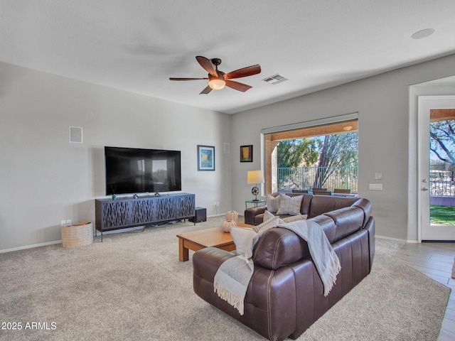 living room featuring ceiling fan